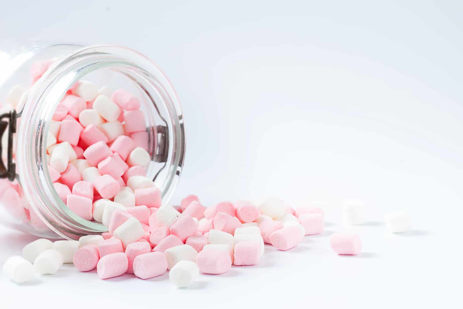 Marshmallows spilling on table