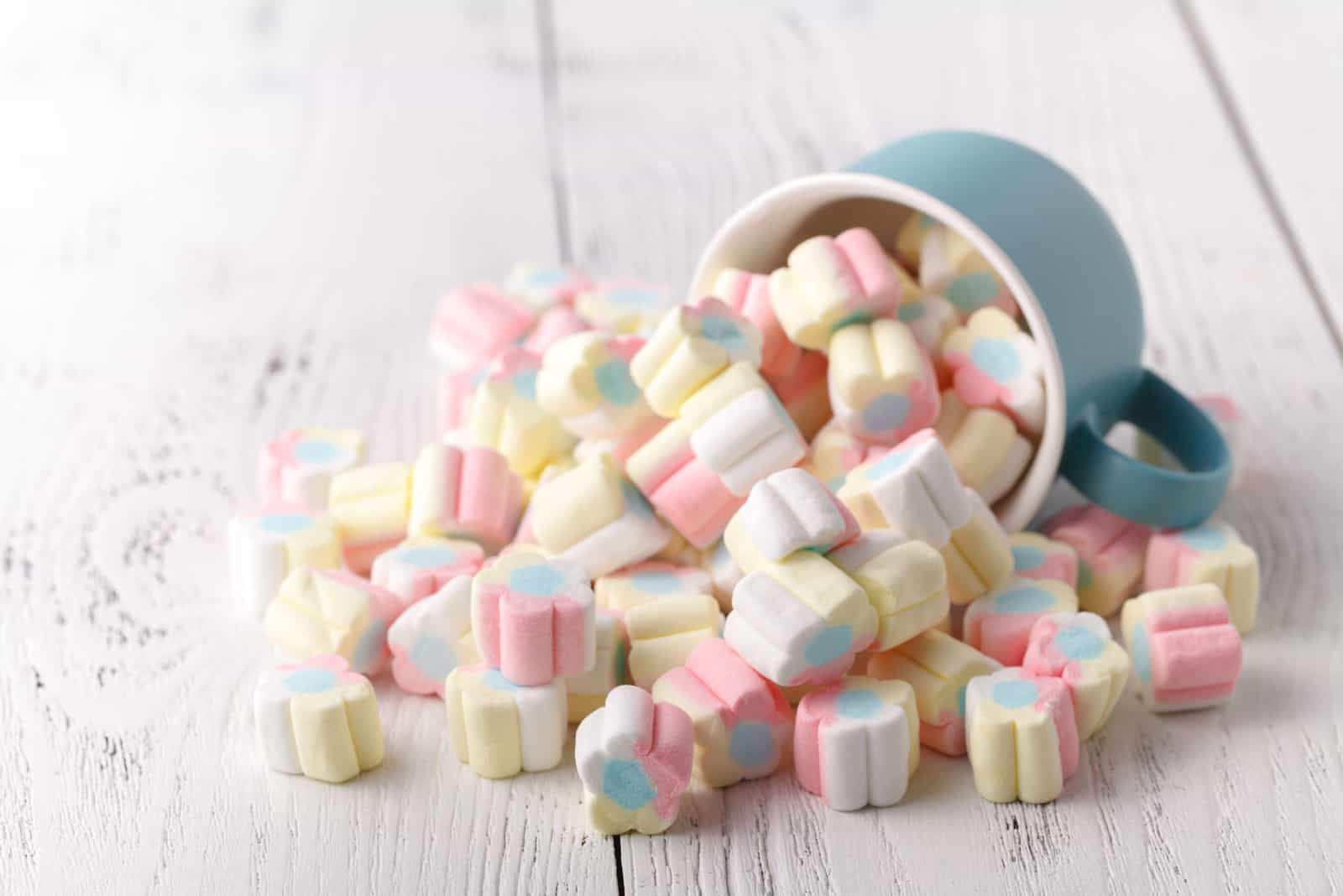 Marshmallows spilling out of cup
