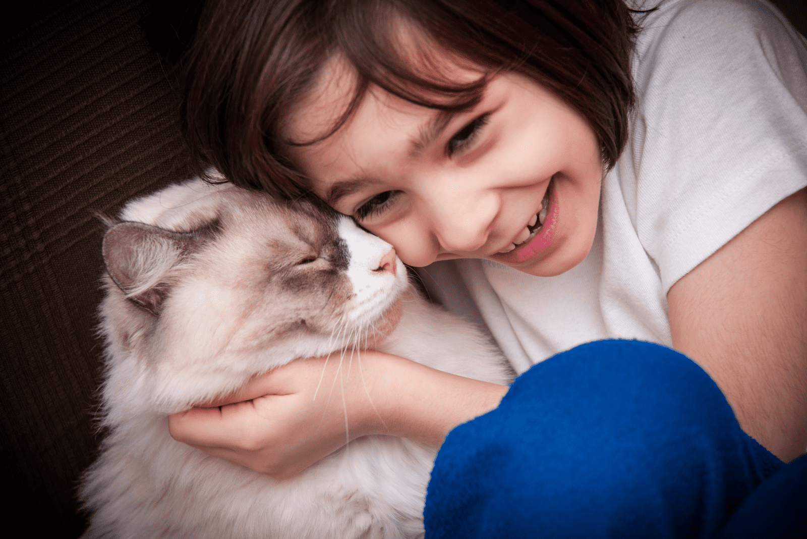Autistic girl with her Siberian cat