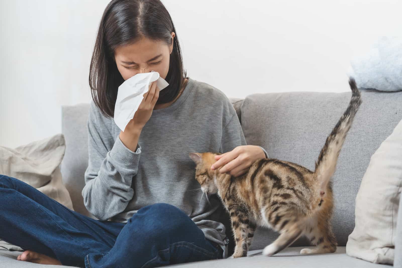 sick woman with a cat