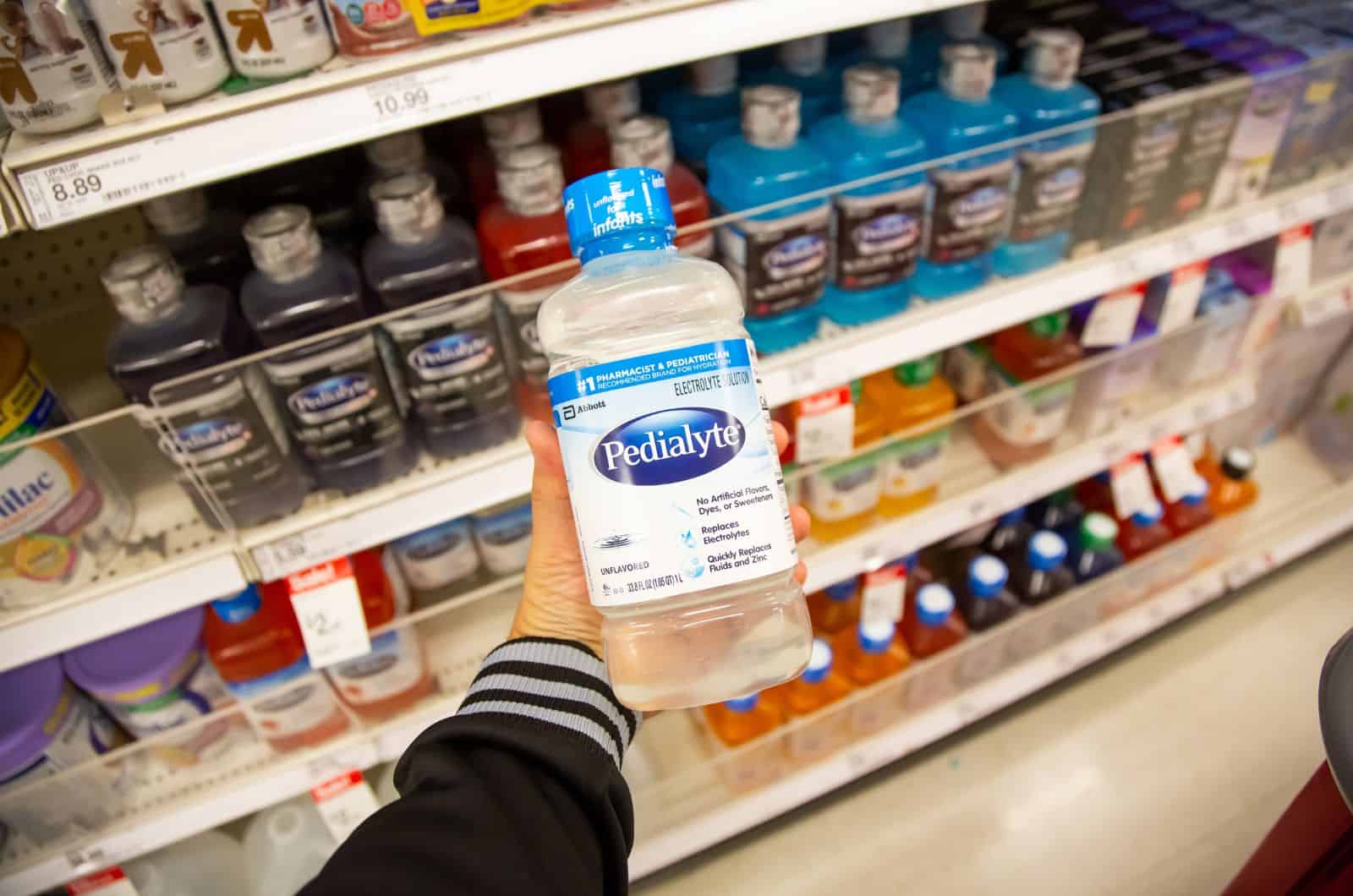 hand holding Pedialyte