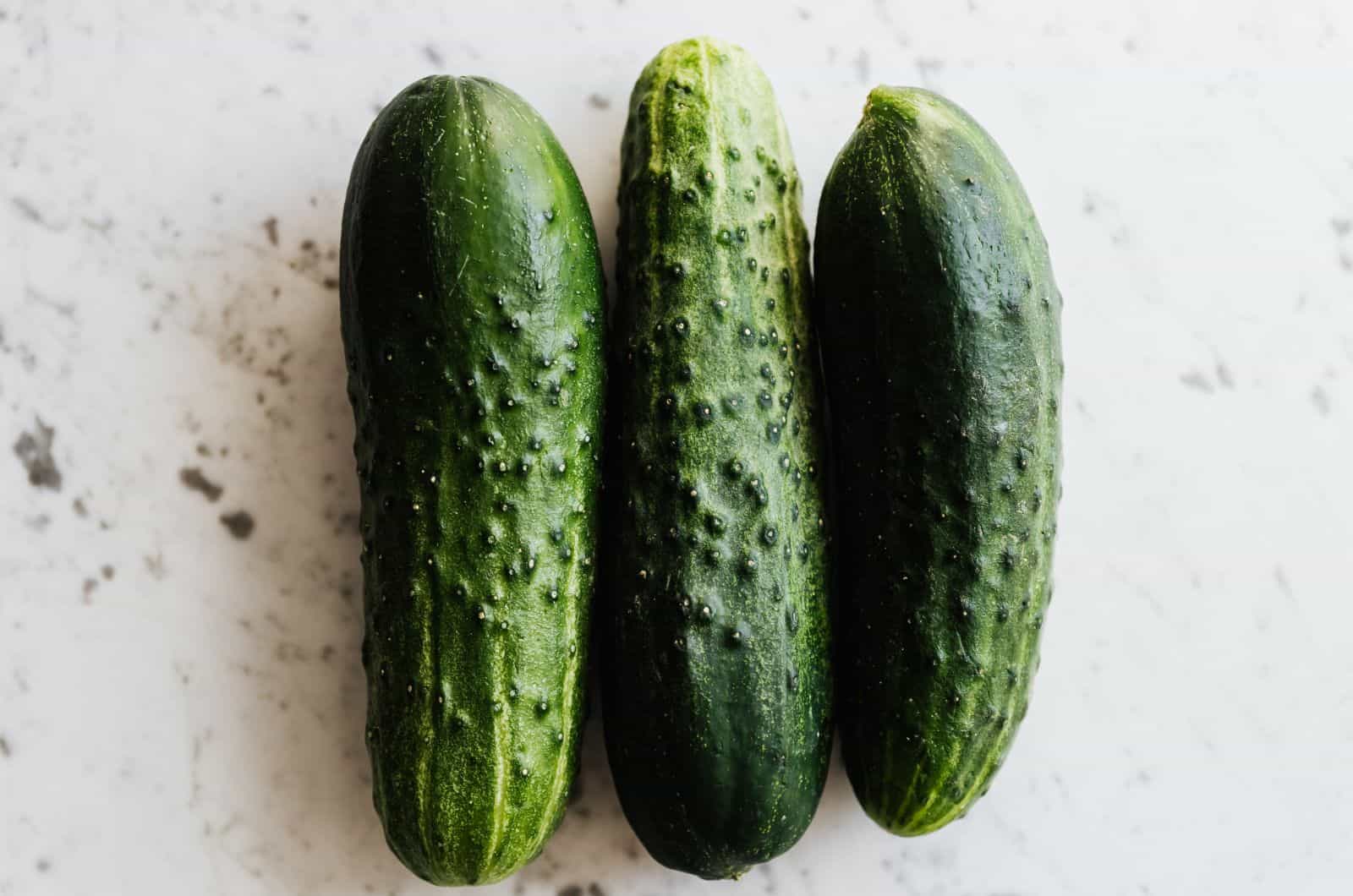 cucumbers sitting on table