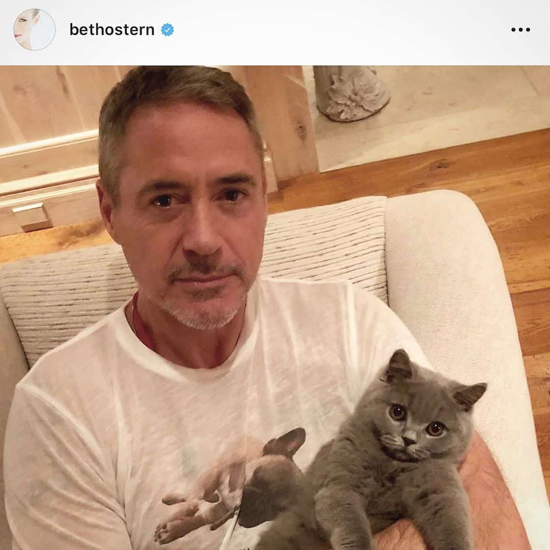 Robert Downey Jr holding his pet cat