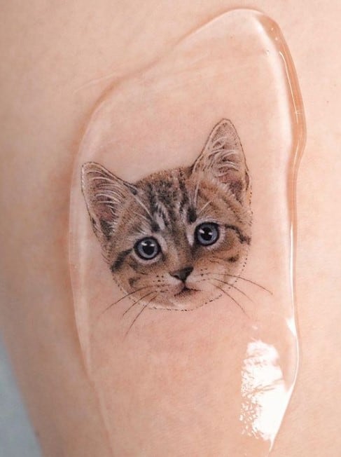 cat head tattoo