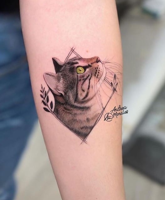 cat tattoo looking up
