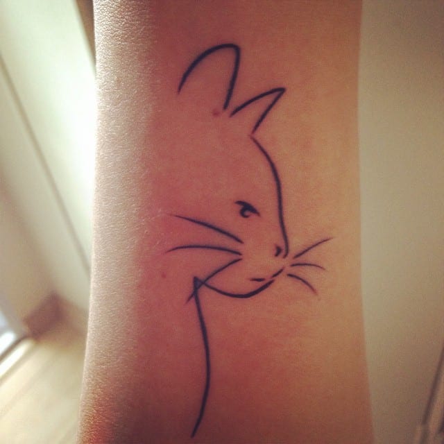 minimalist cat tattoo