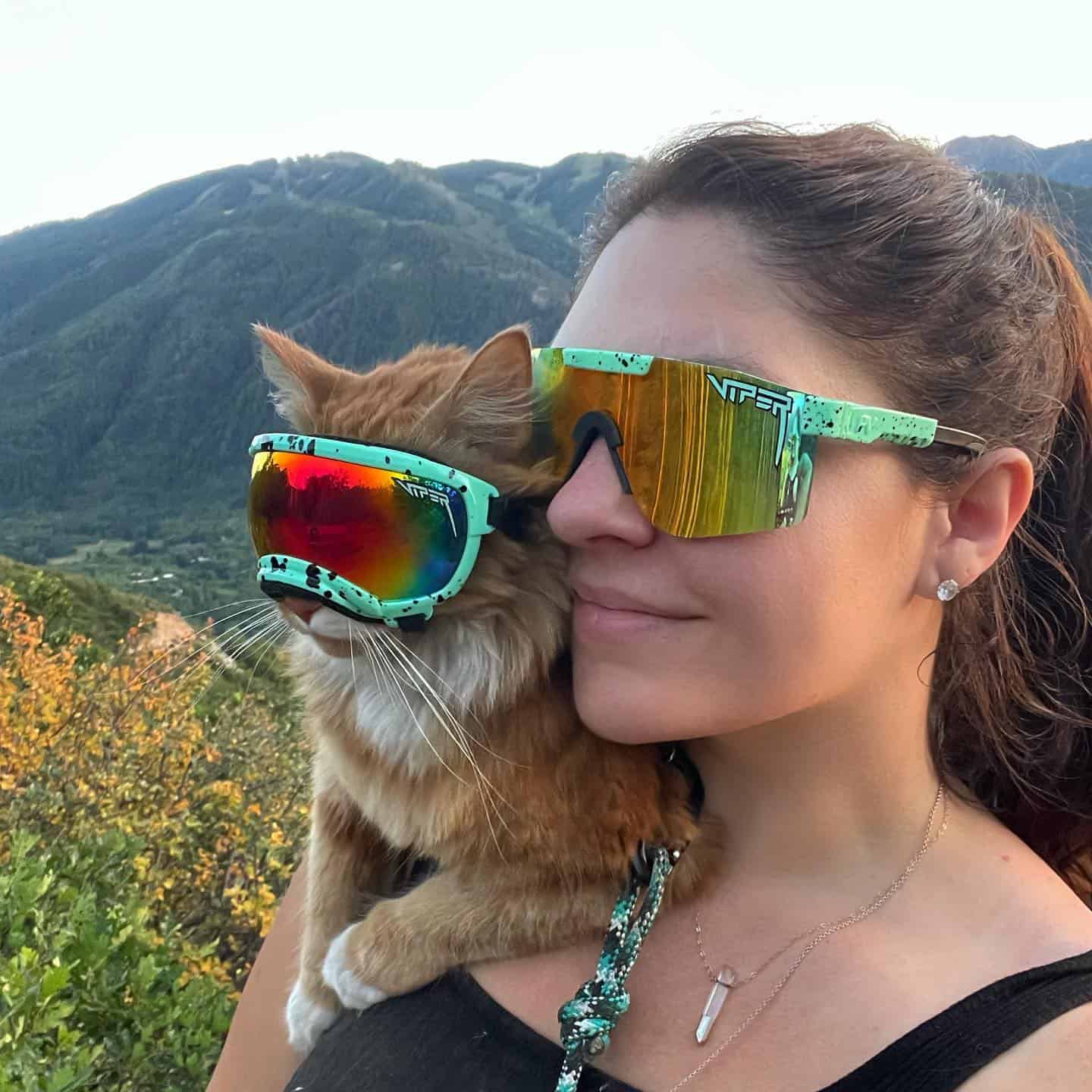 woman and cat with skii glasses