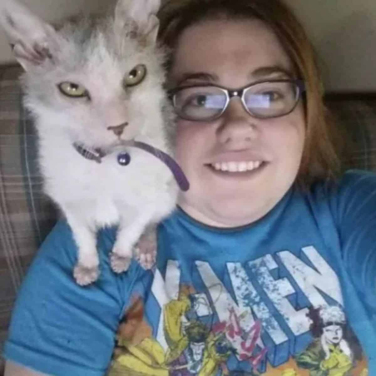 photo of possum with her owner