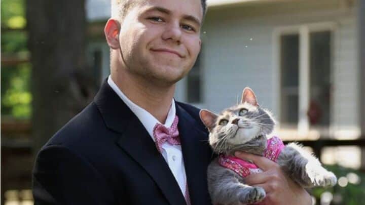 guy with cat on a prom