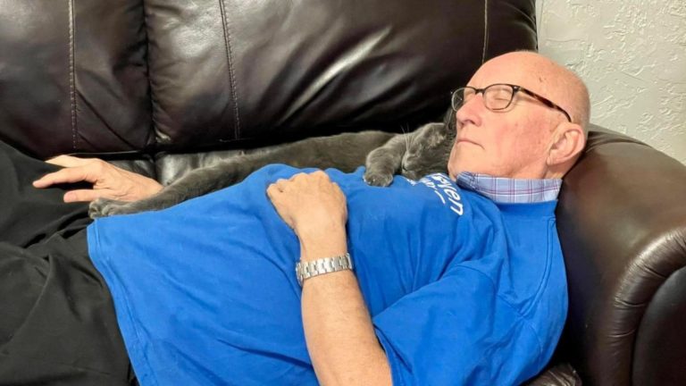 grandpa with cat sleeping