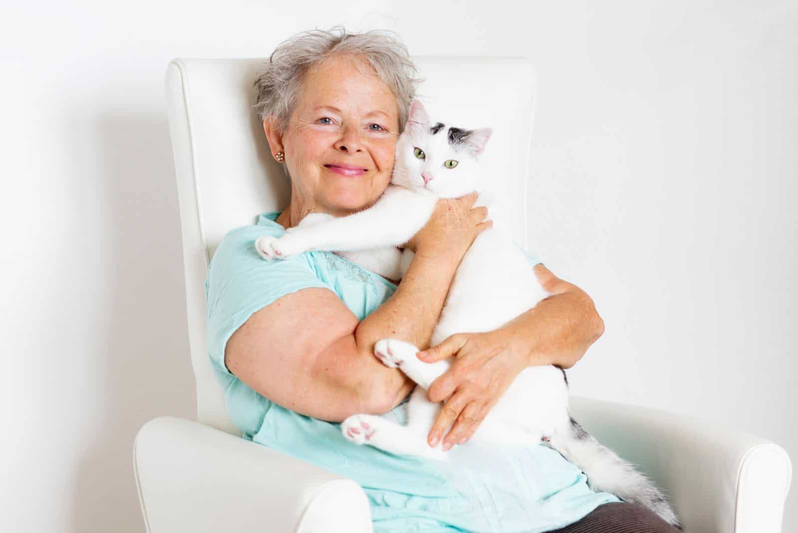 Granny holding a cat