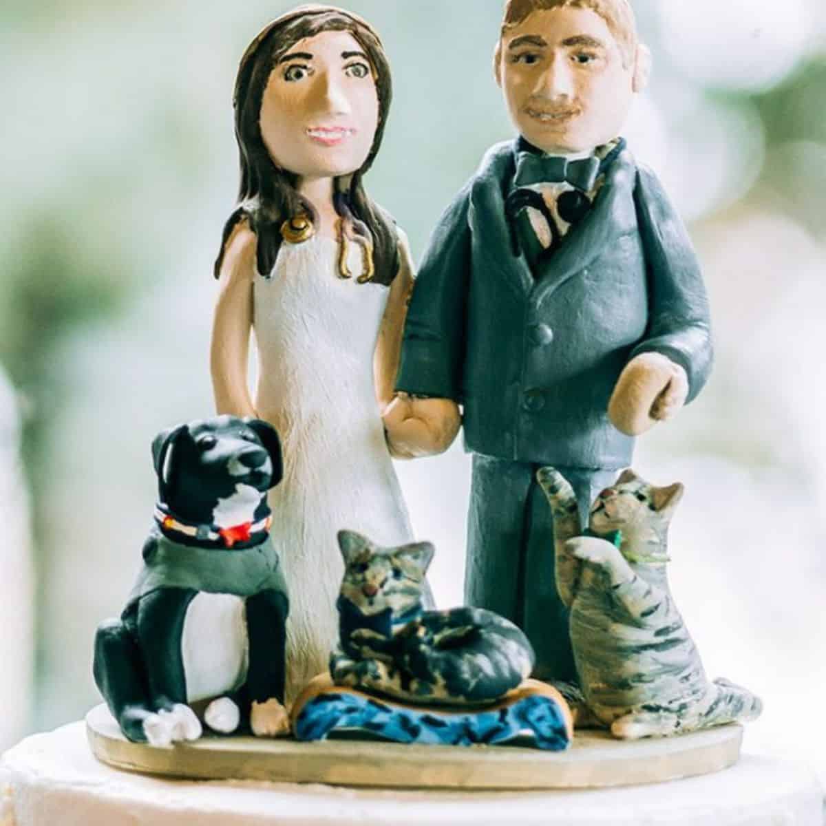 bride and groom figures with animals