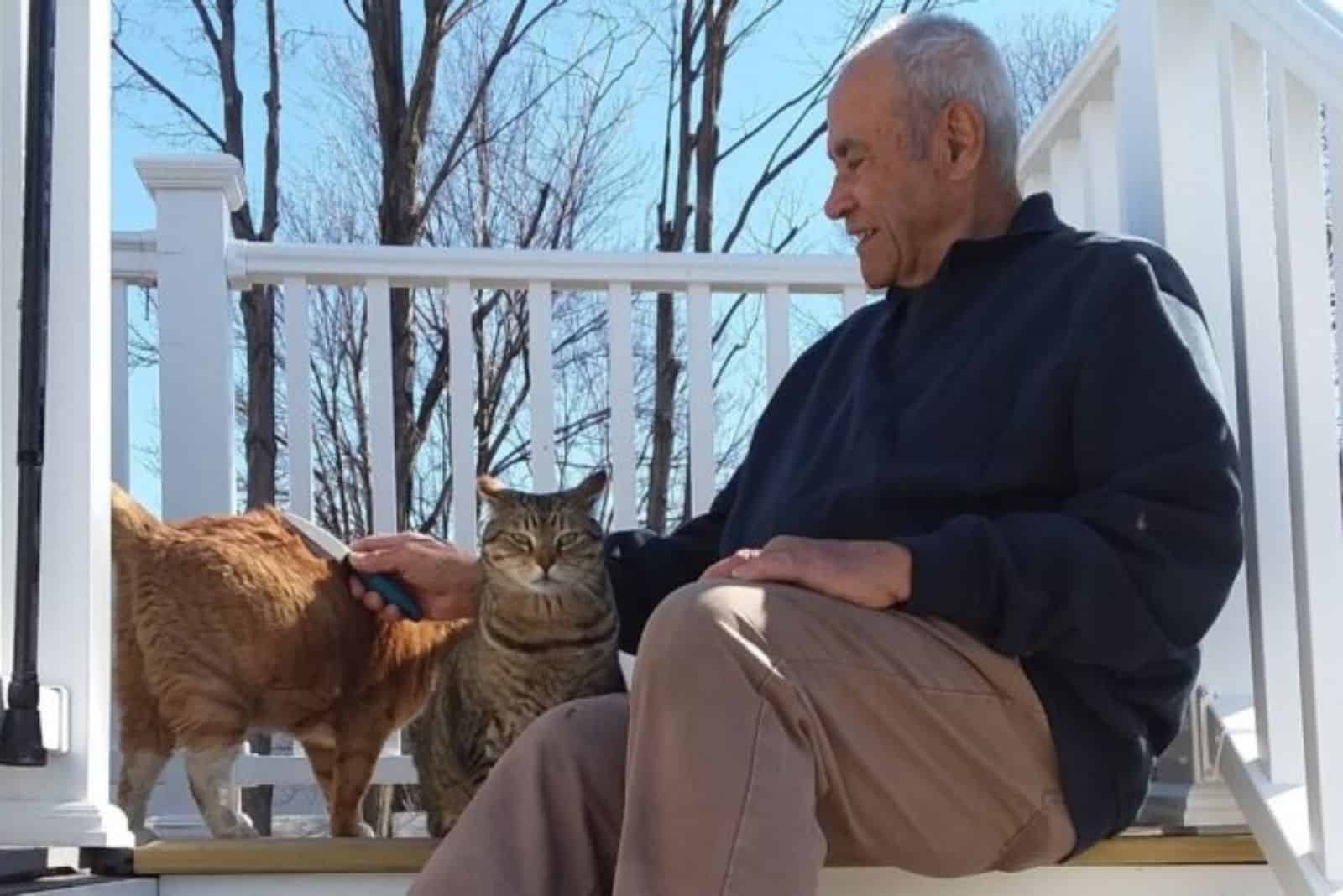 veteran with his two cats