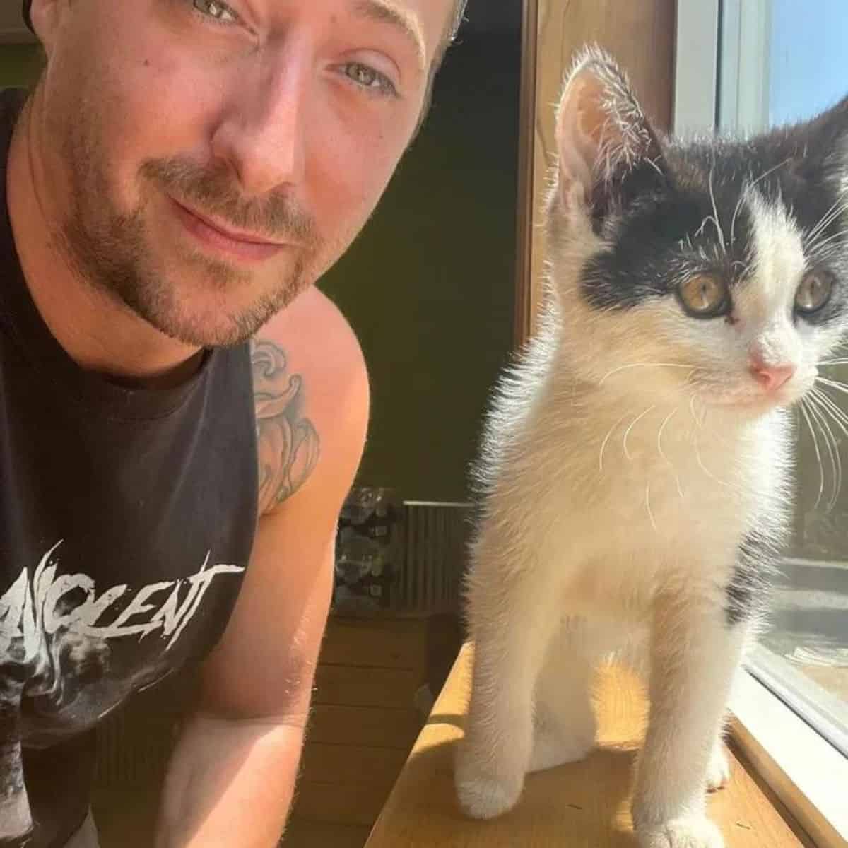 guy and kitten