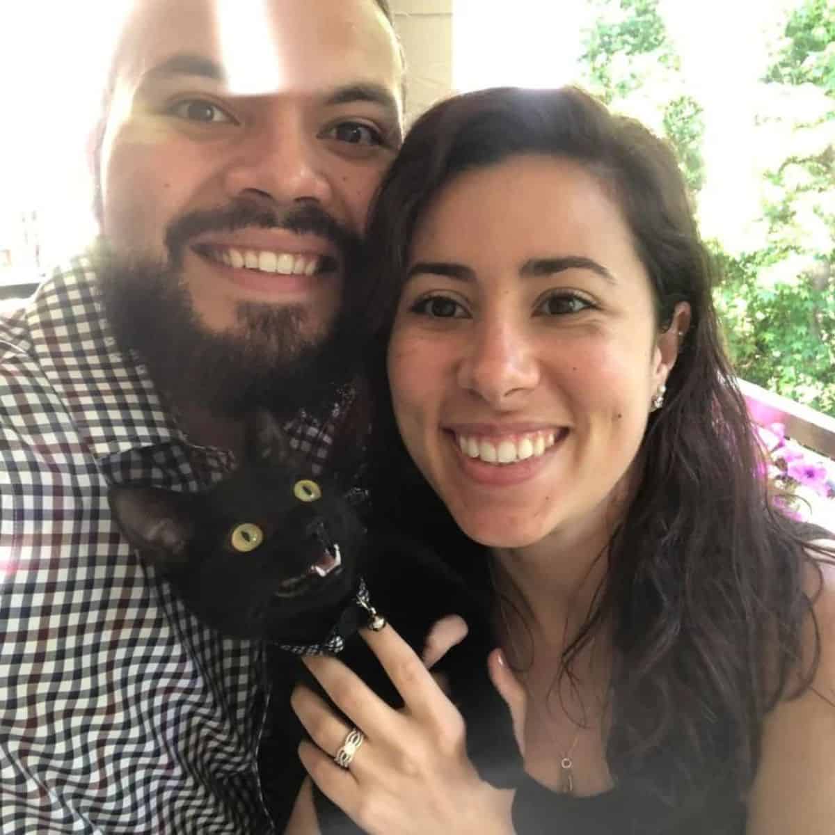 happy couple with cat