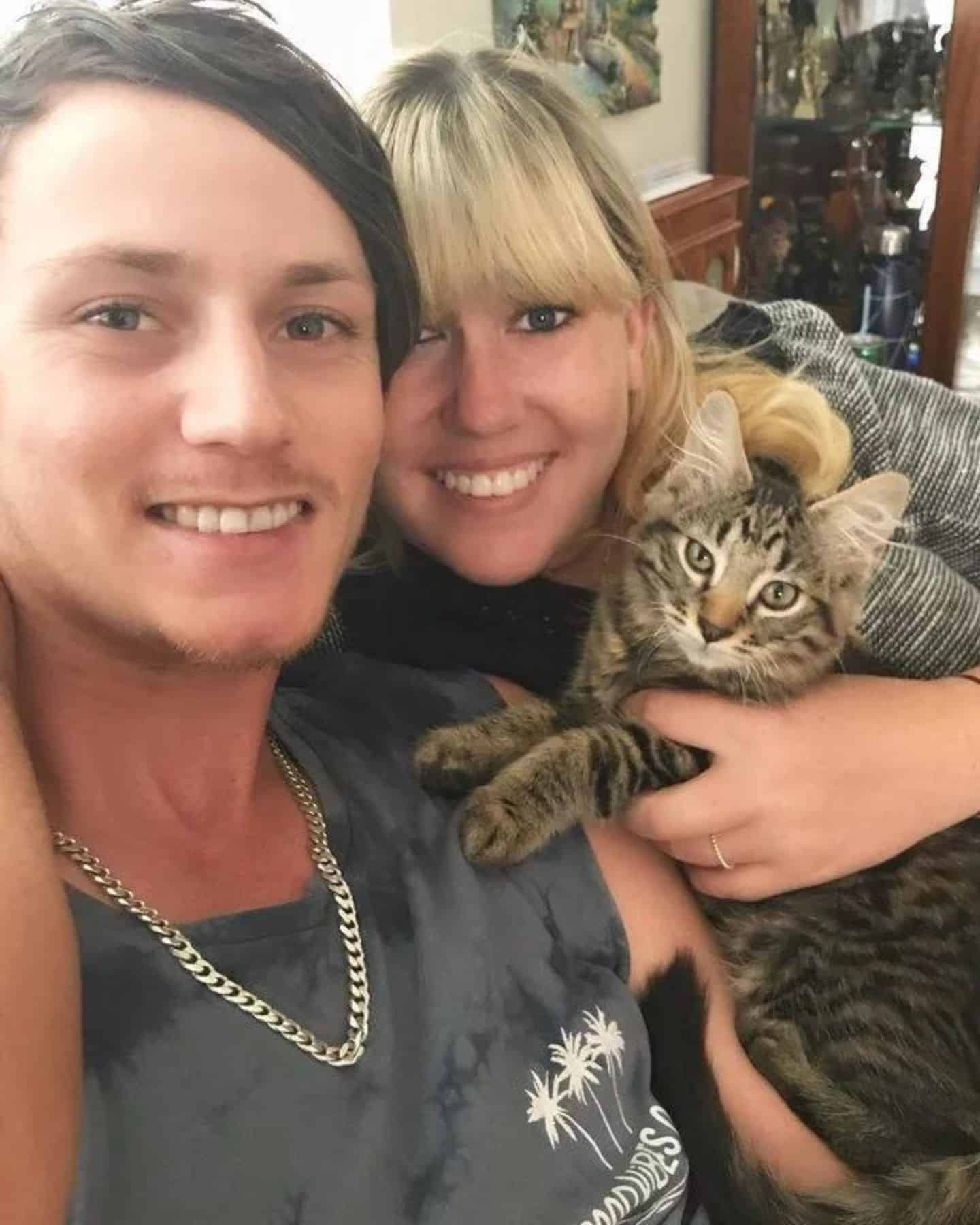 photo of couple with a cat