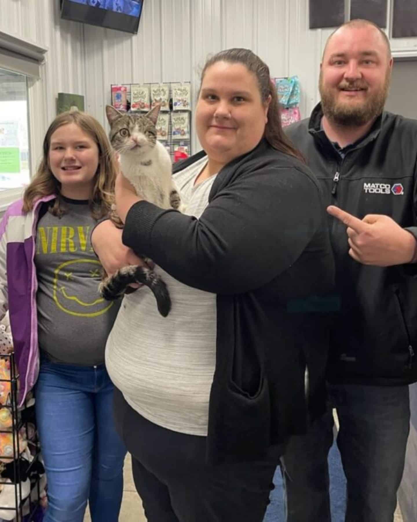 family and cat with special needs