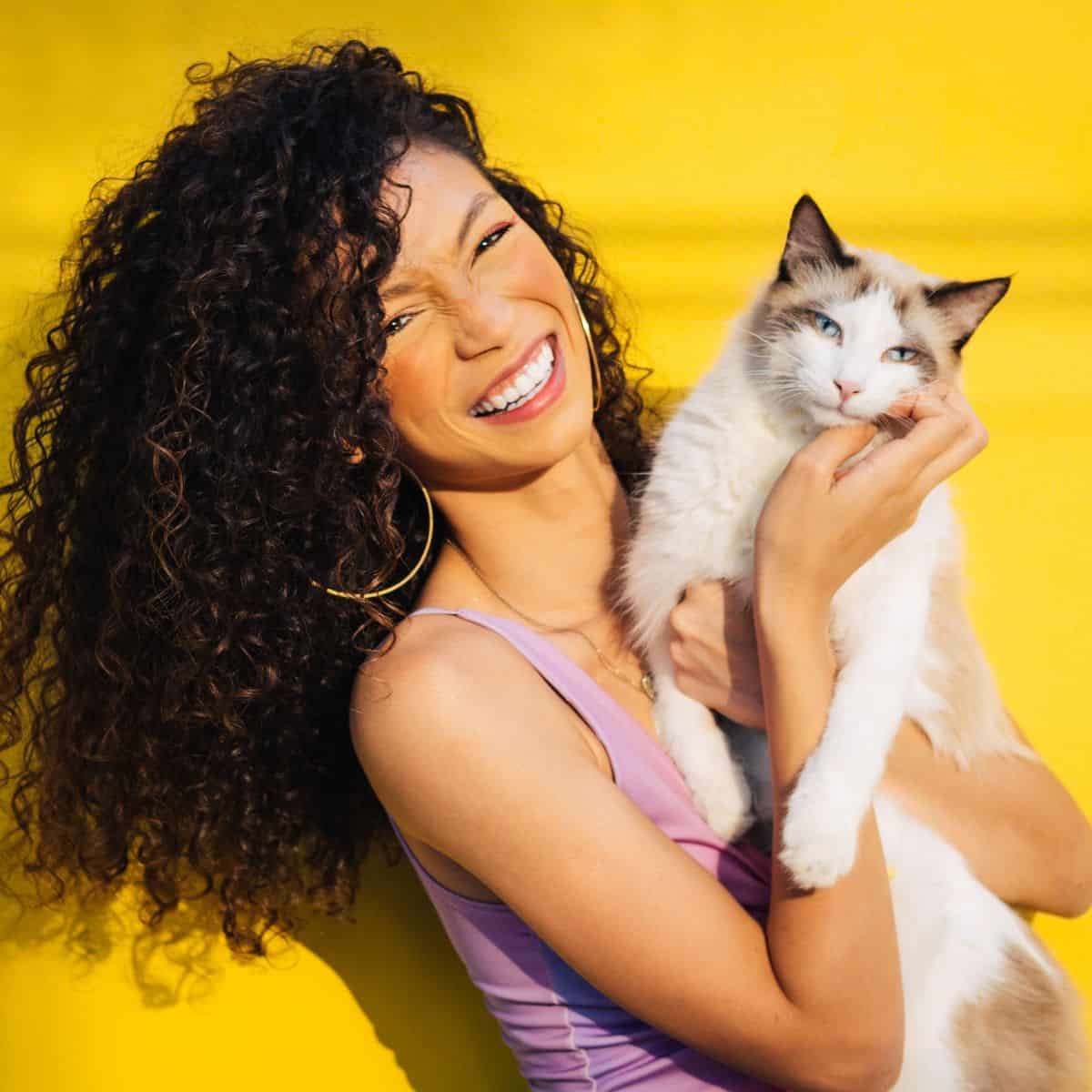 happy woman with cat