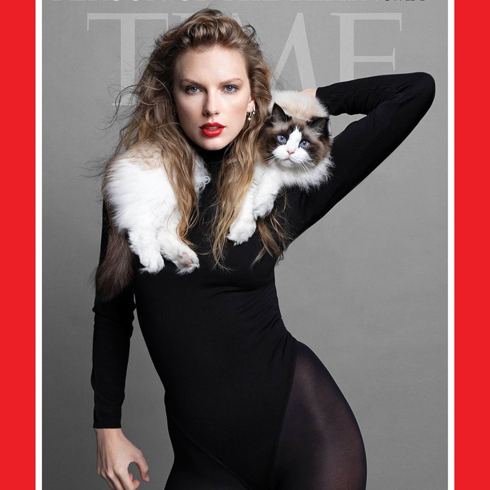 taylor swith with a cat on a cover of a magazine