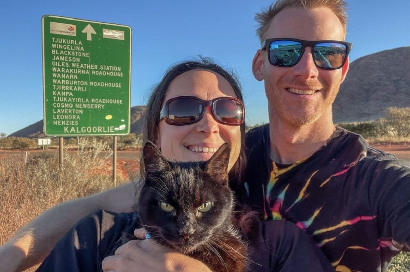 man-woman-and-cat-traveling