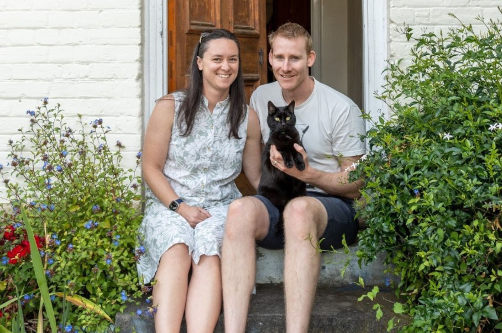 woman-and-man-holding-a-cat