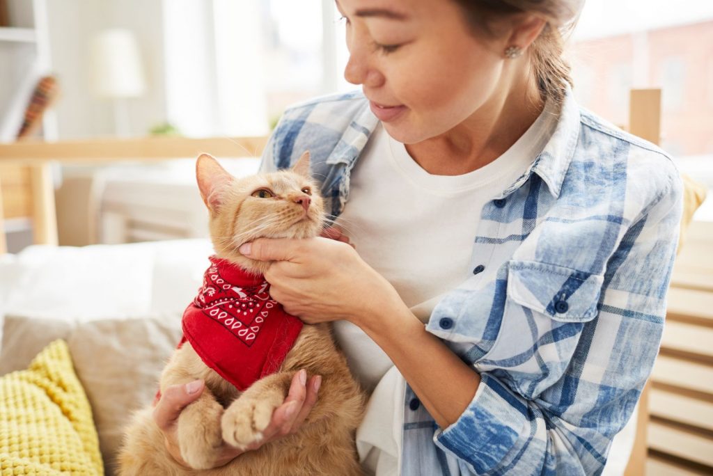 woman talking to her cat