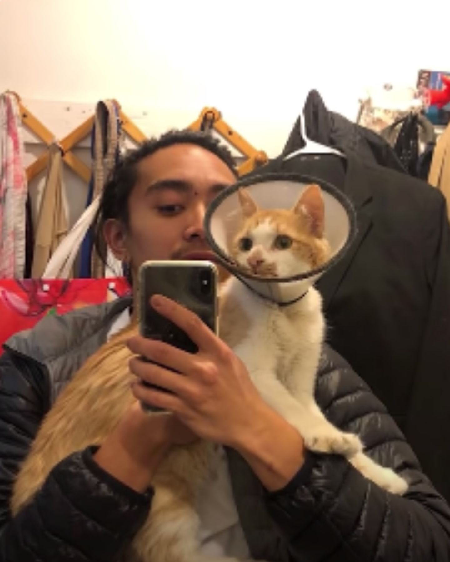 guy and cat taking selfie