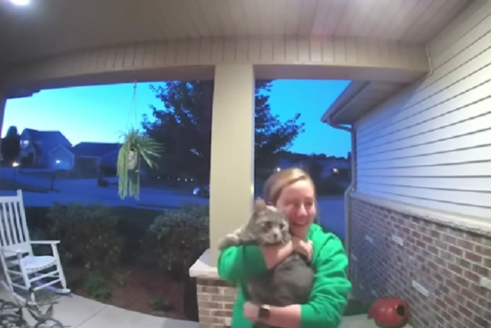 happy woman got cat in hands