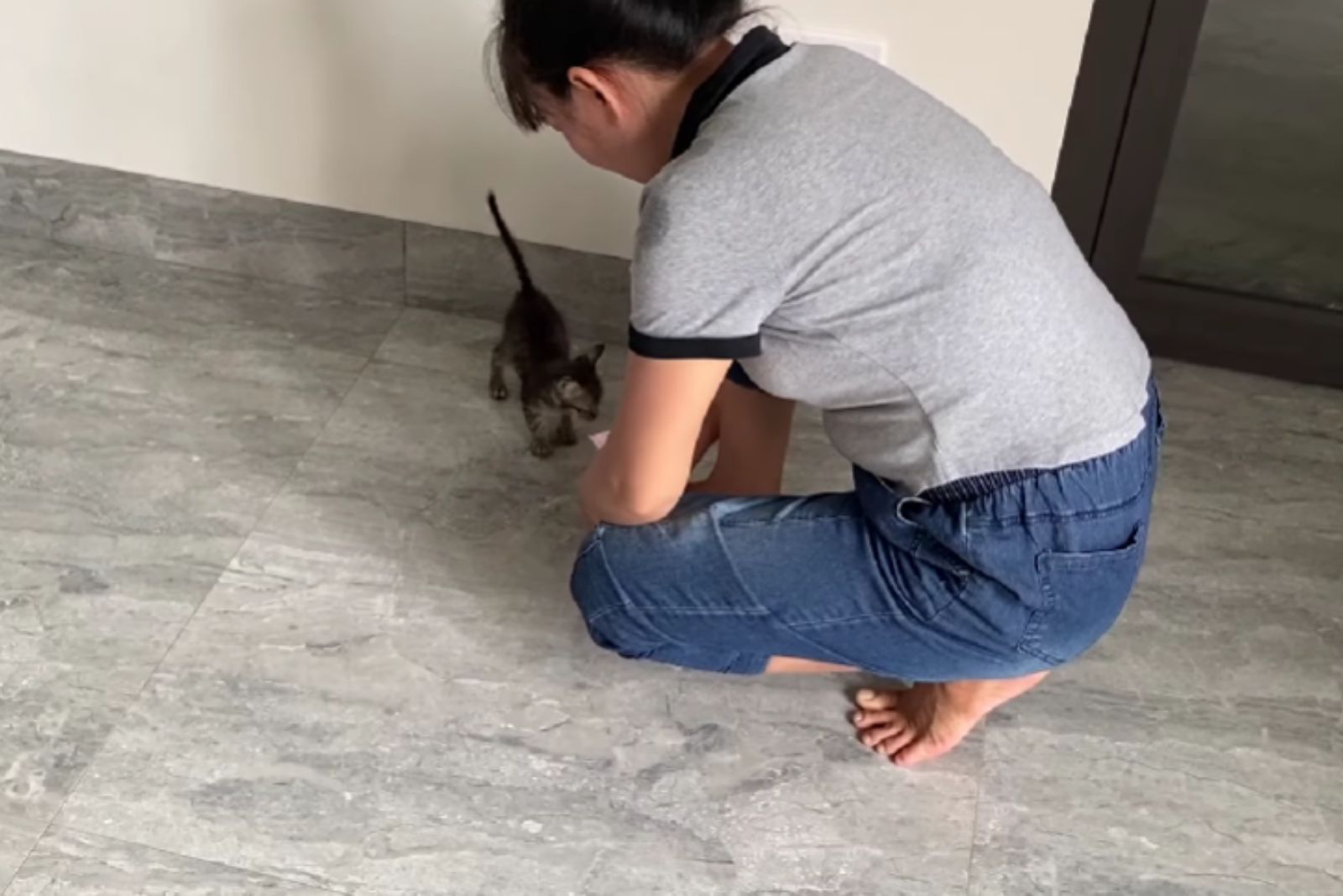 woman and very sweet kitten