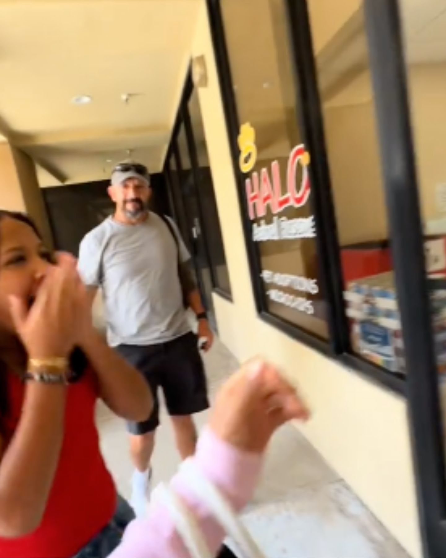 emotional little girl with her dad in a shelter