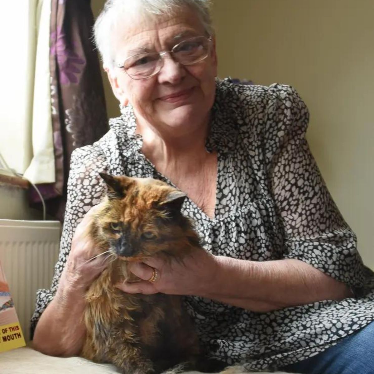 old woman and old cat