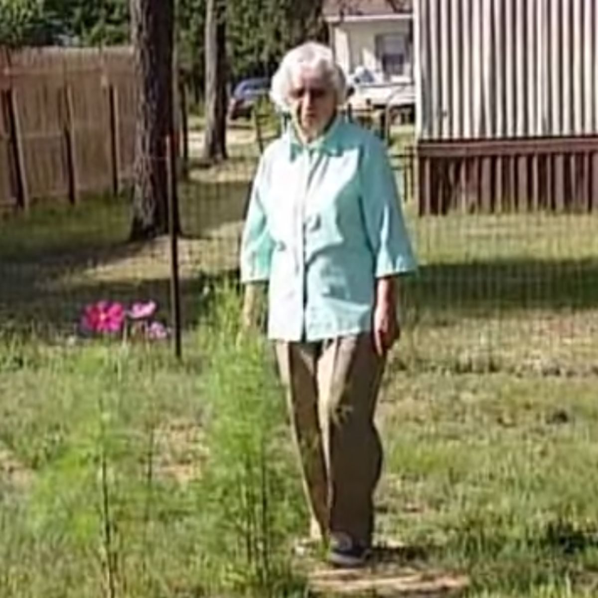 woman standing in yard