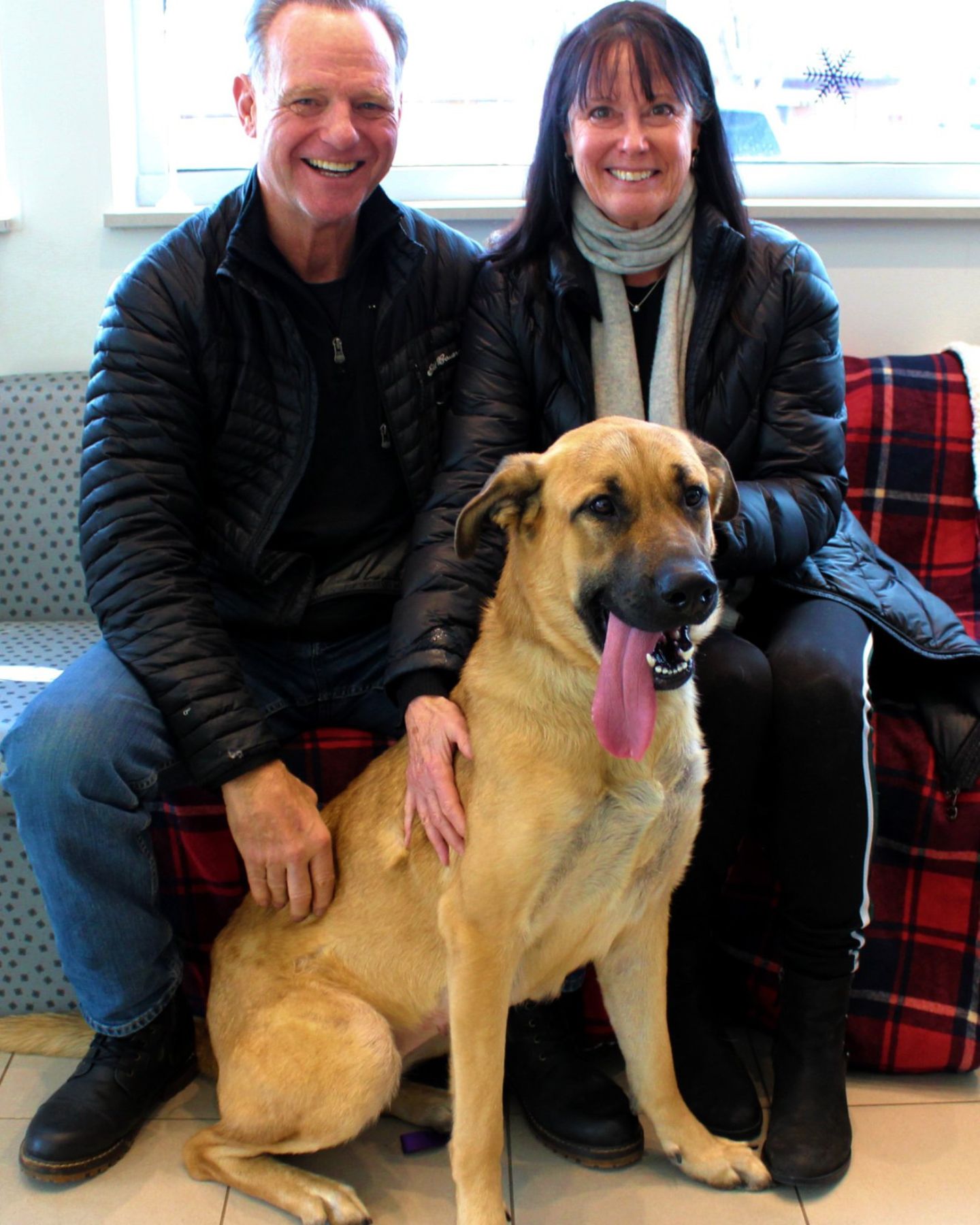 old couple and dog