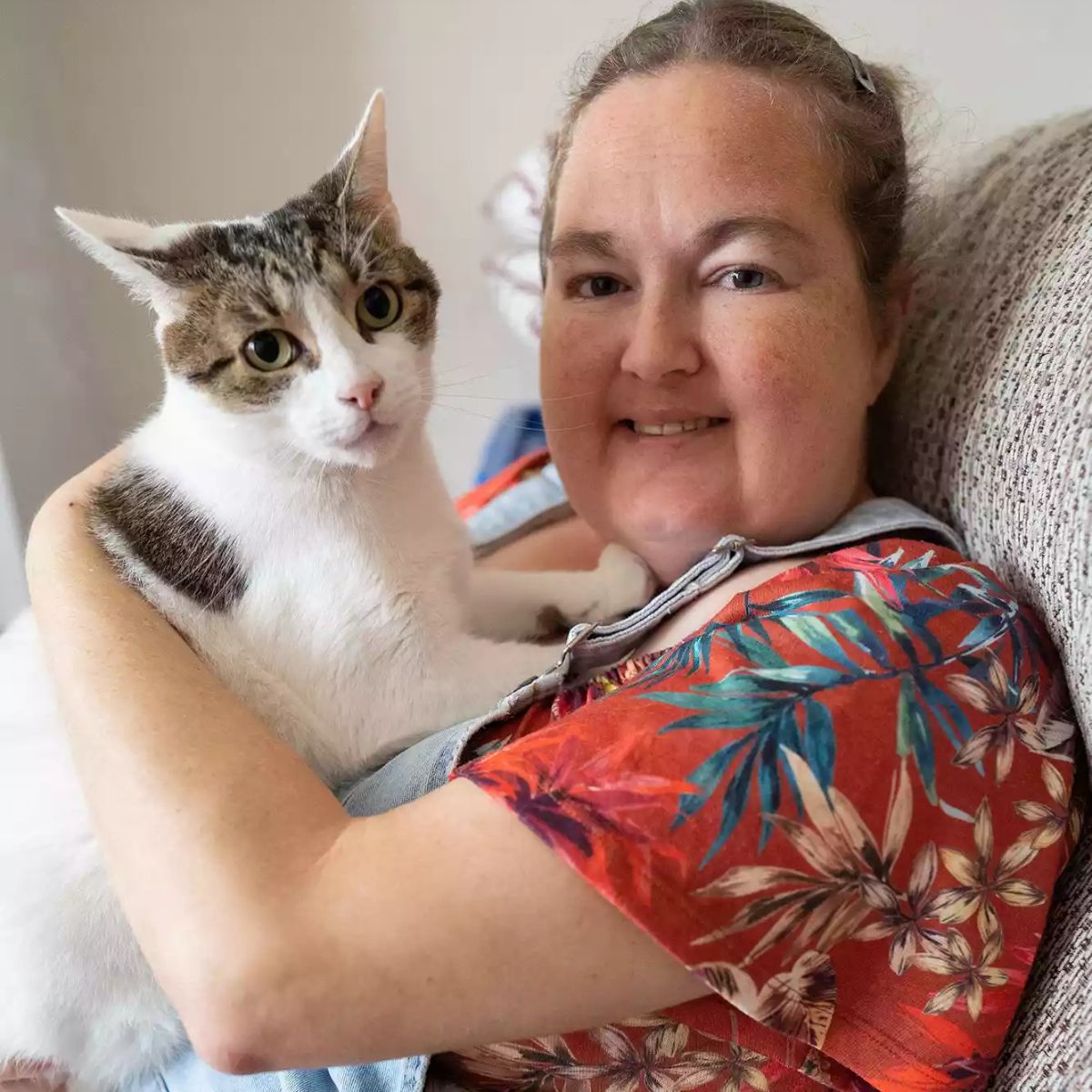 woman holding a cat