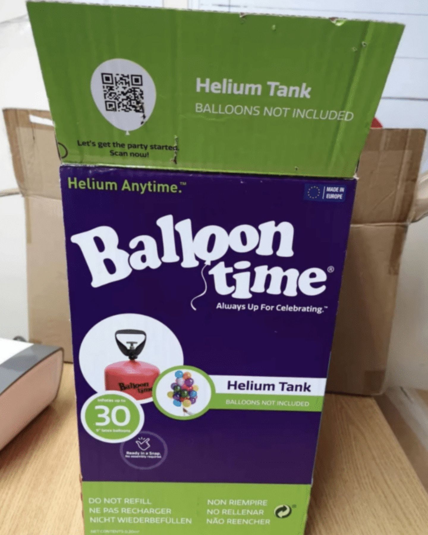 helium tank in a cardbox