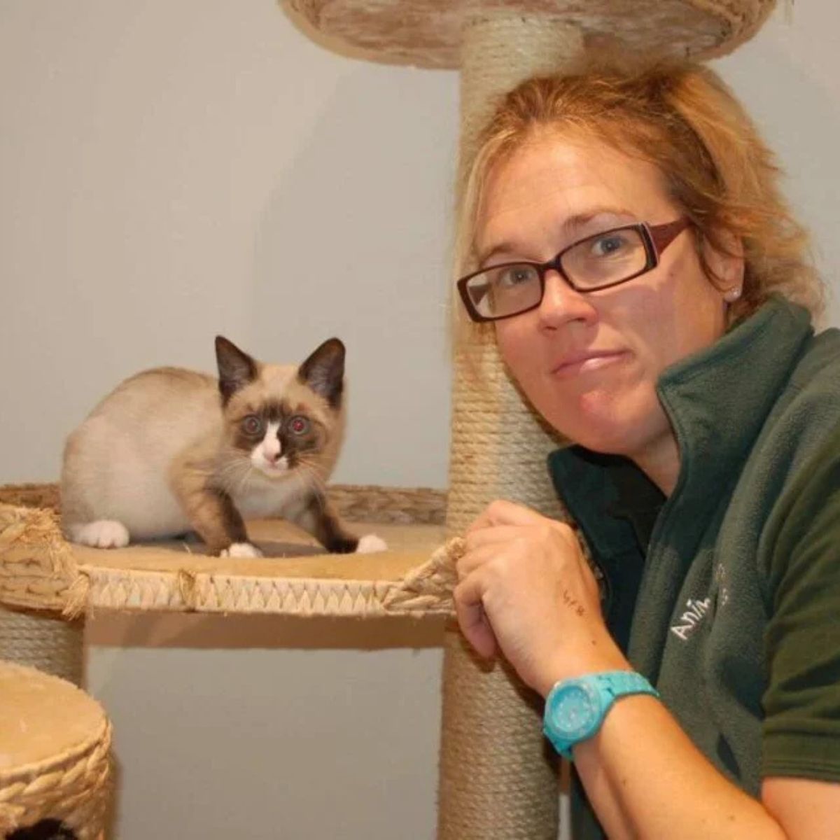 photo of woman and a cat