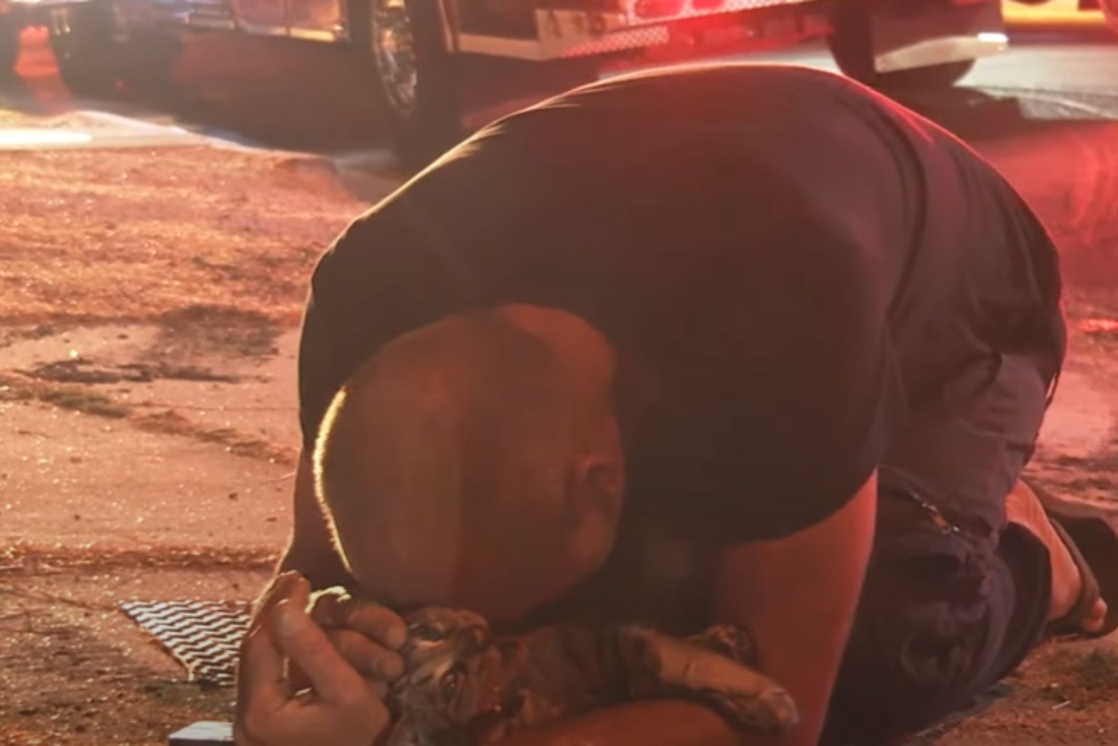 relieved man holding a cat