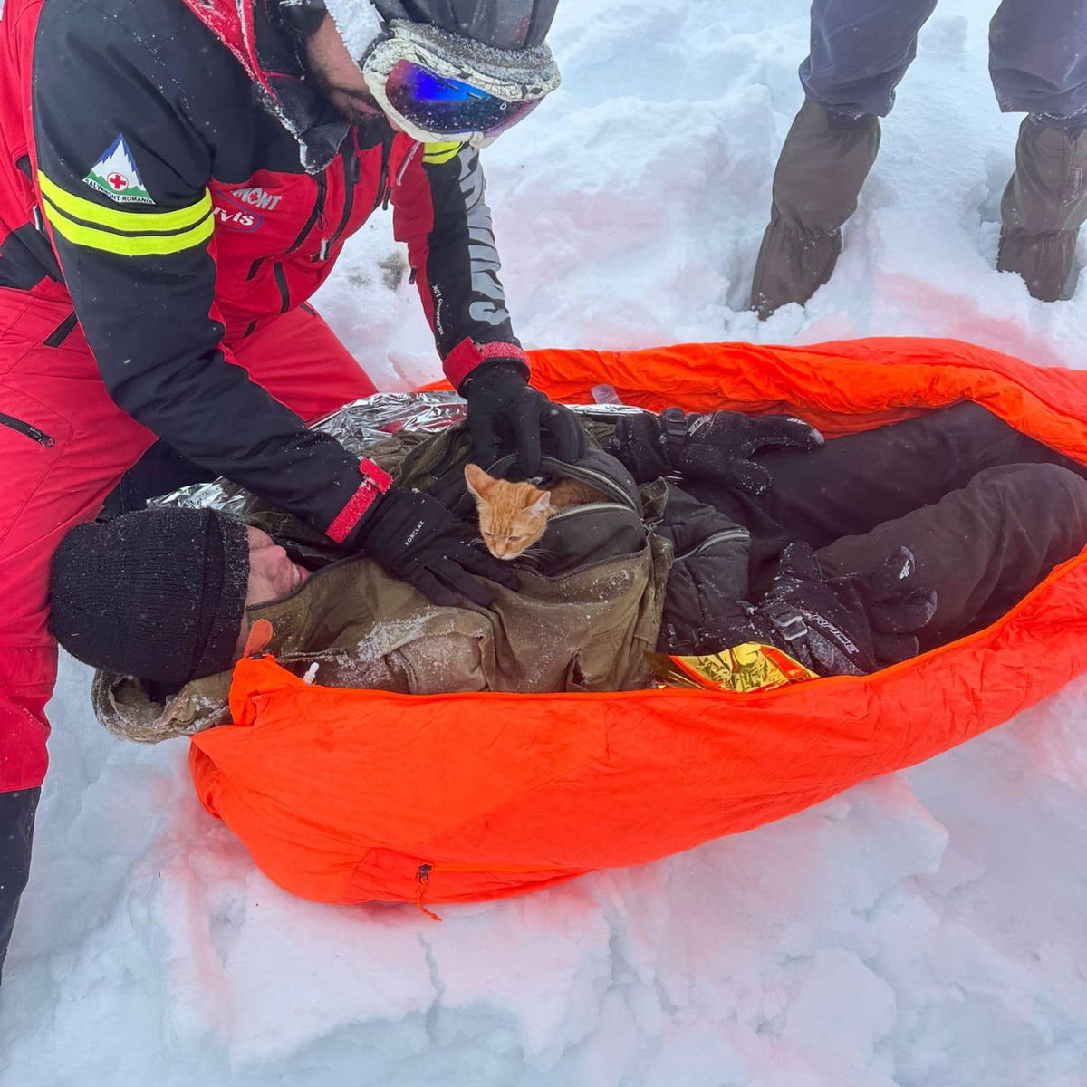 rescue team helping man