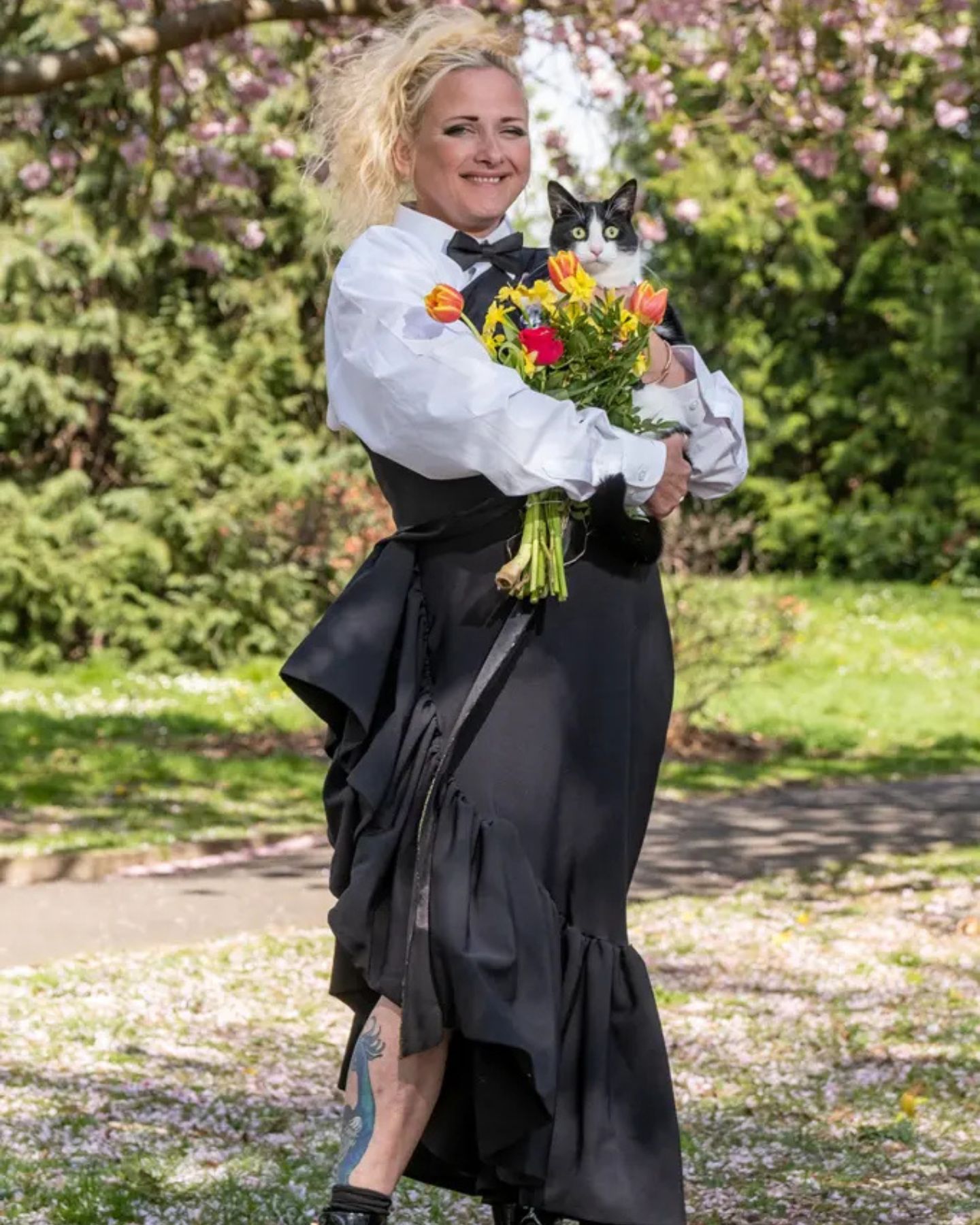 bridewoman holding a cat