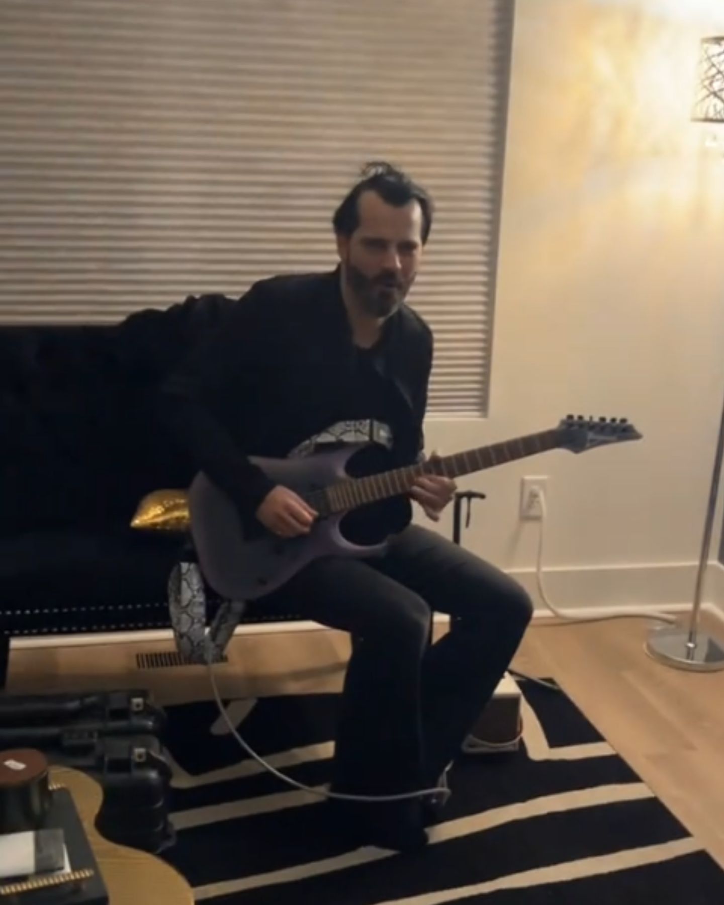 man playing a guitar