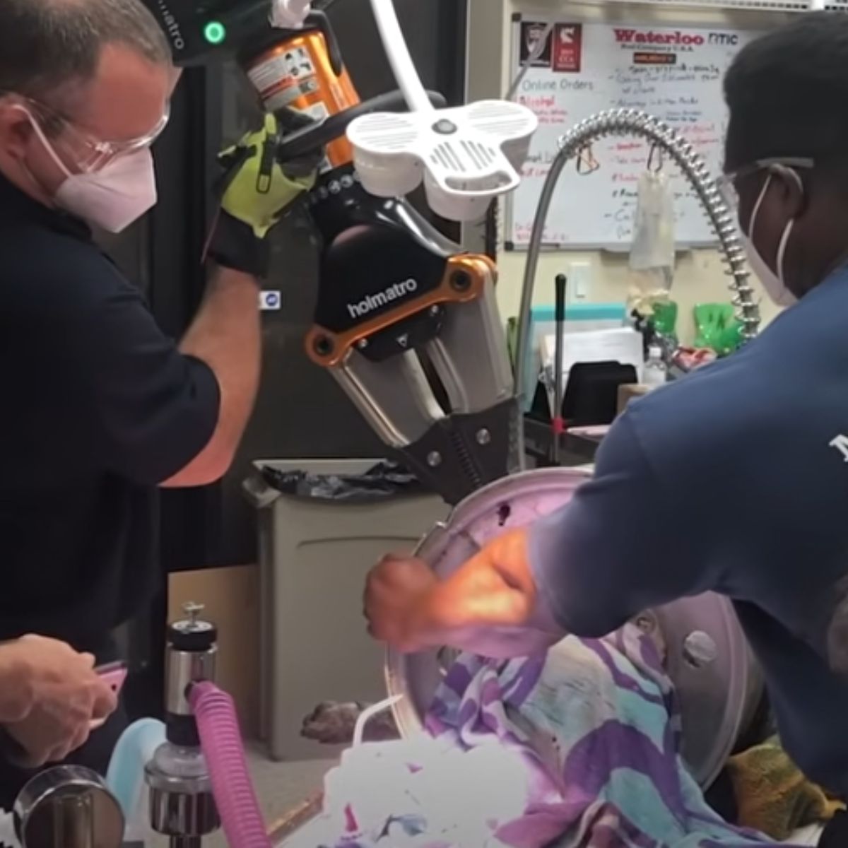 rescuers cutting a rim