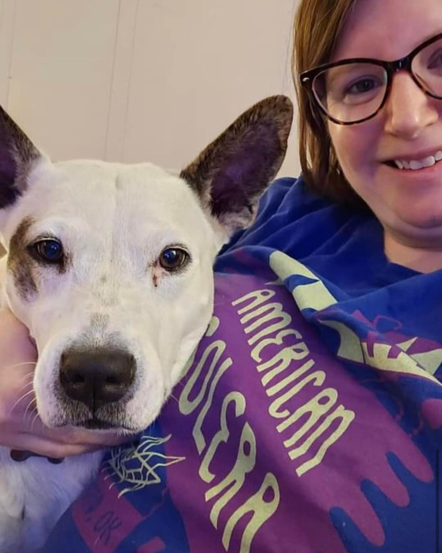 woman and white dog
