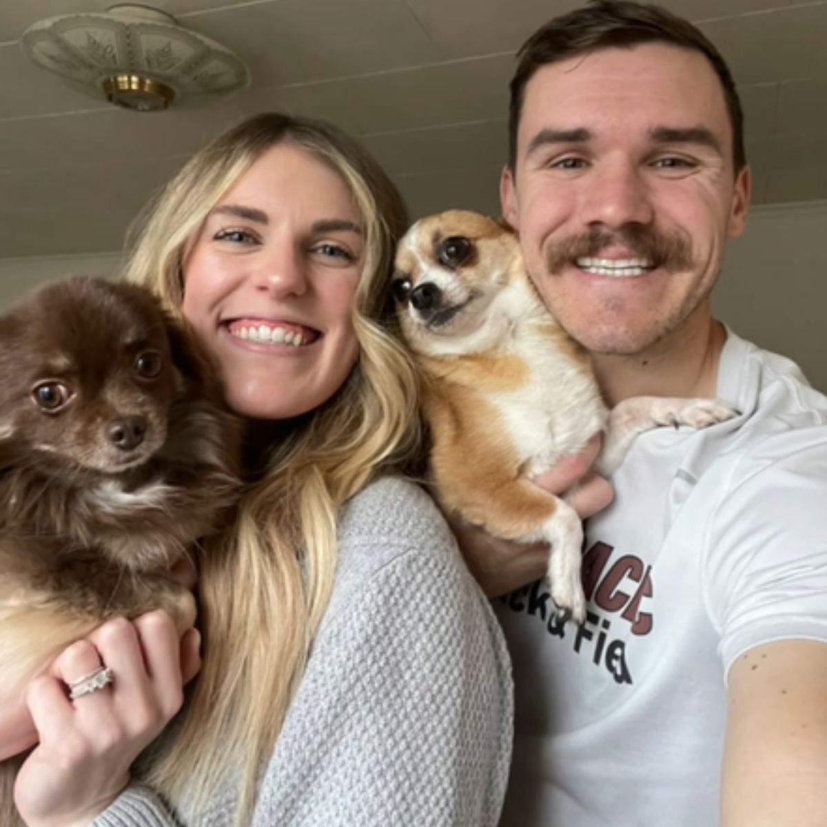 couple and chihuahuas