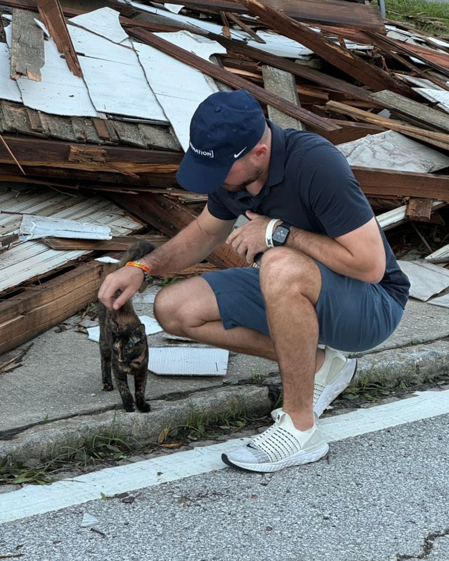 man and cat