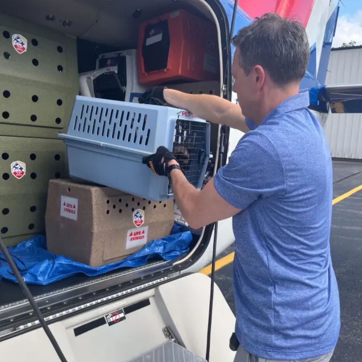 man holding a crate
