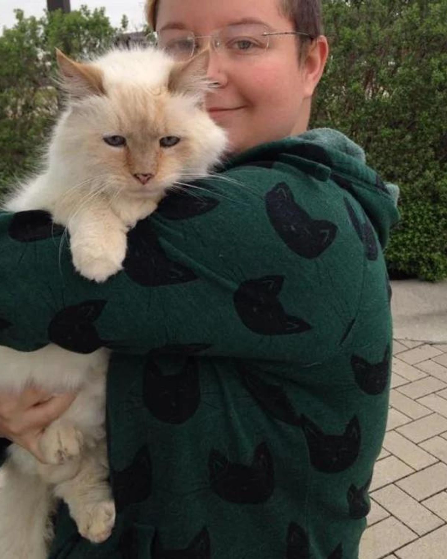 boy holding cat