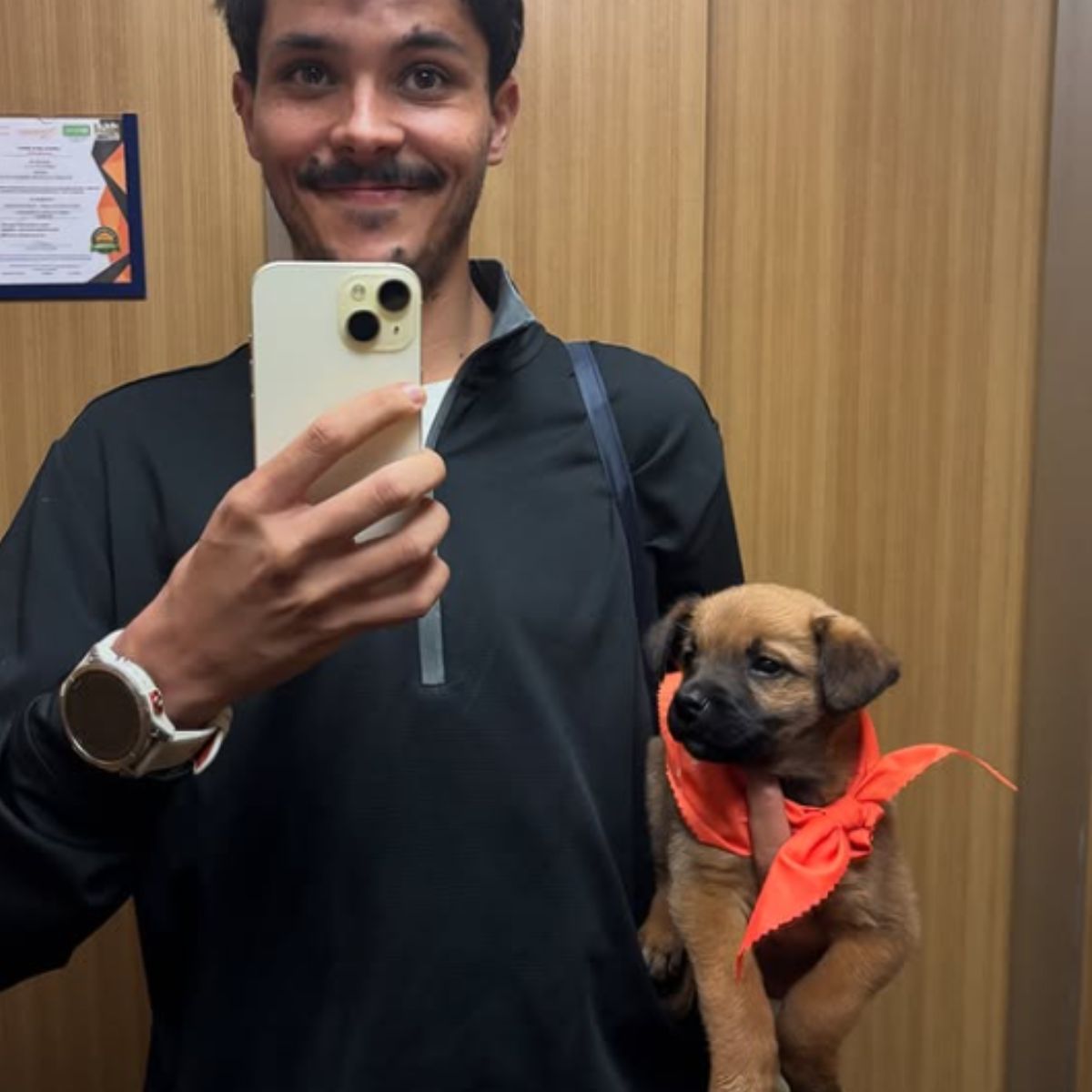 man and a puppy