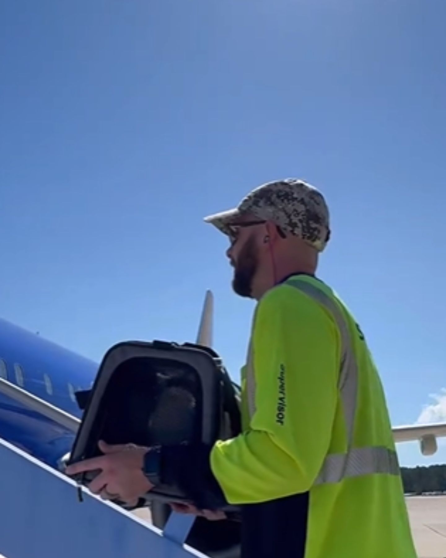 man holding the carrier
