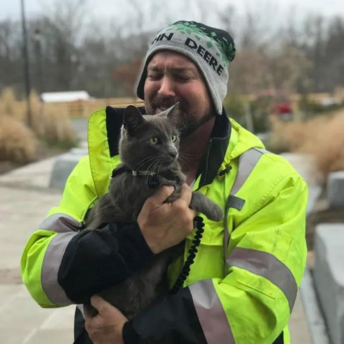 man holding the cat