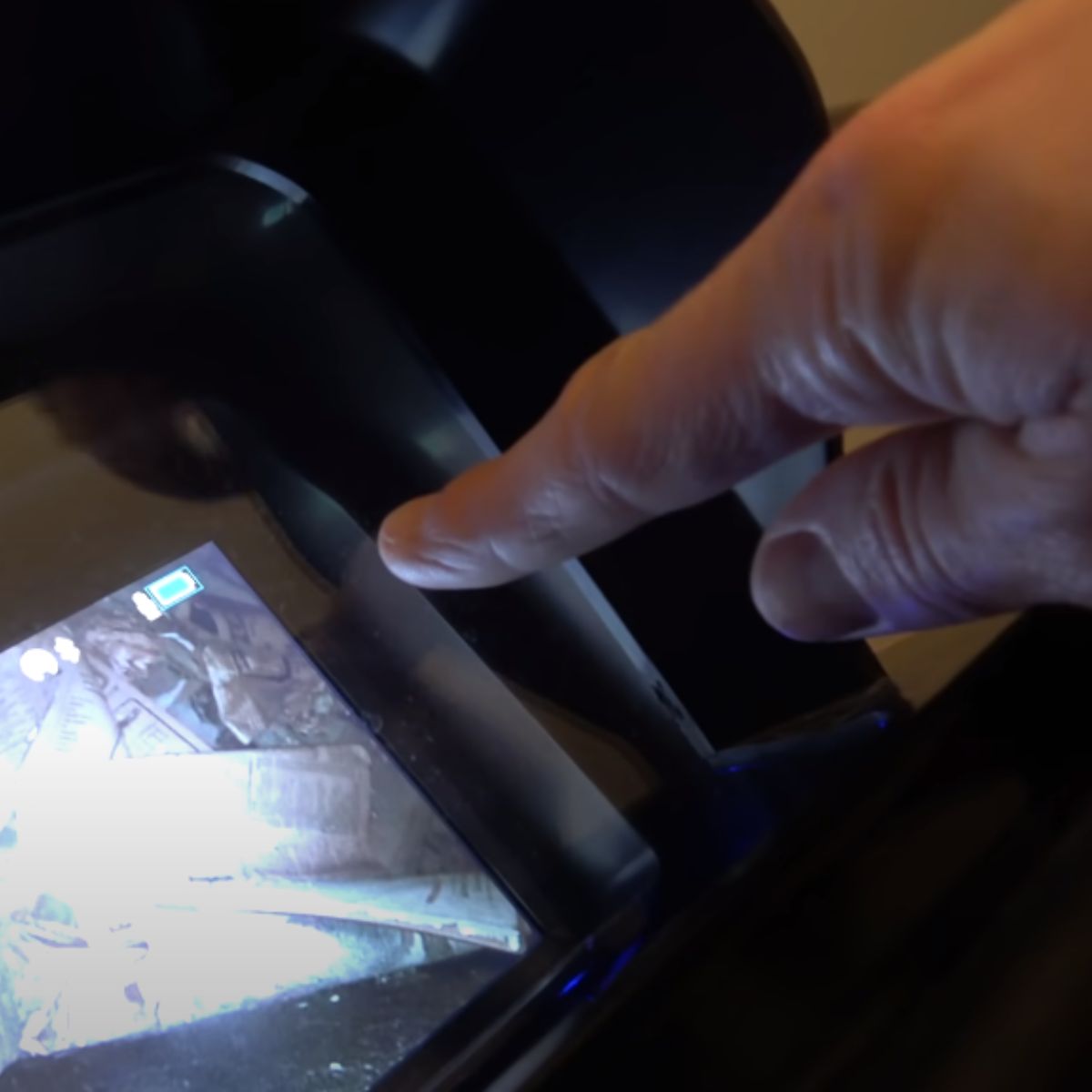man pointing at the screen
